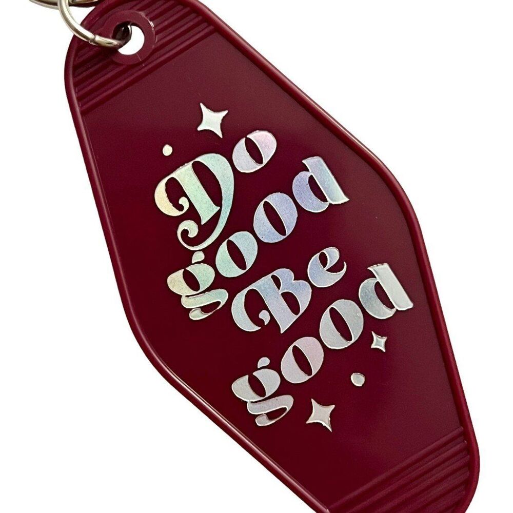 Burgundy Motel Room Keychain  Holographic print says “Do Good Be Good”
